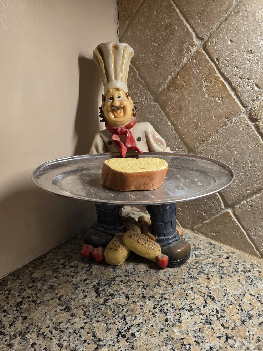 Source Unknown Cream Chef Figurine Cake Stand with Red Scarf and Silver Tray